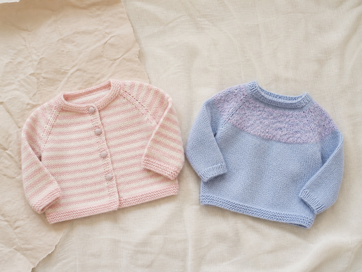 Made-to-order design reference for a blush striped baby cardigan and a sky blue knitted baby pullover